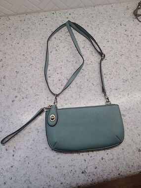 Ladies Blue Pebbled Leather Crossbody Bag